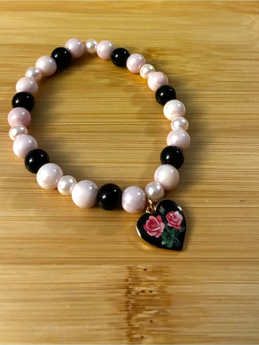 Pink and Black Beaded Heart Charm Bracelet - Floral Accent